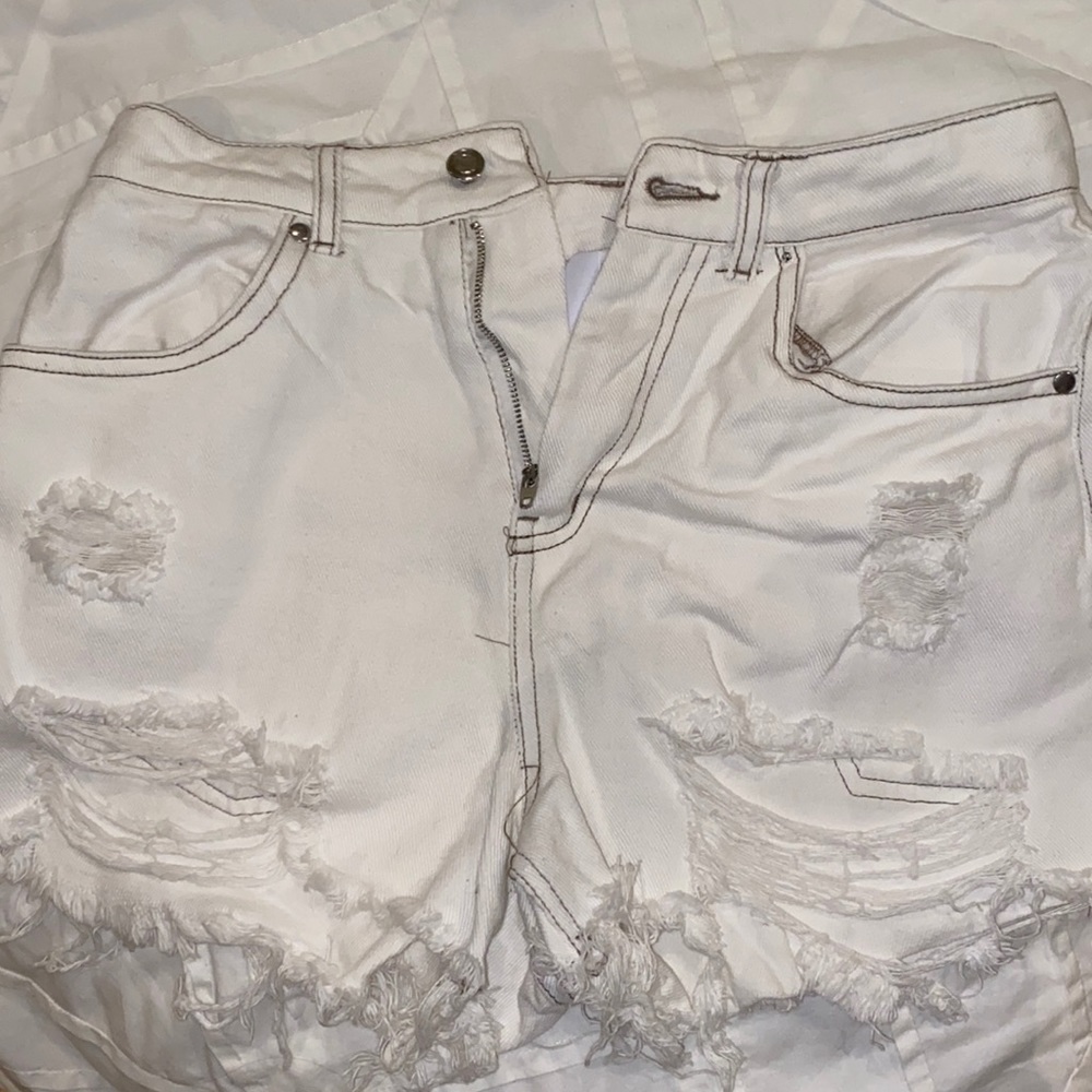 Brand name is hyfve hyfve and they are size small and the color is white!